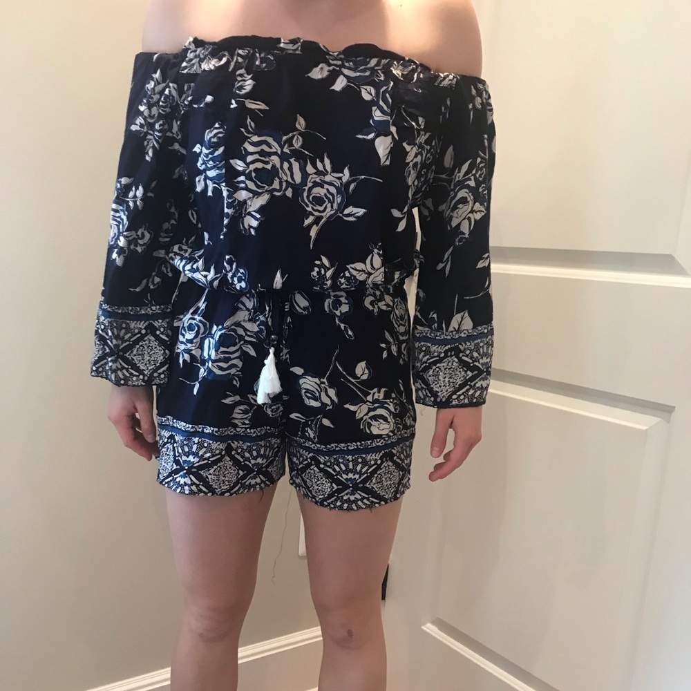 Blue romper with flower print